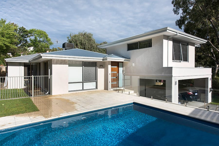 The home extension was designed around an attractive swimming pool, providing a lovely aspect from every window.