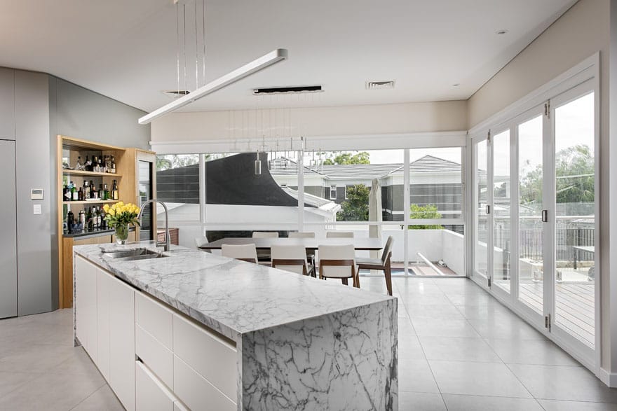 A beautiful kitchen integrated with a living area makes for a very happy family life!